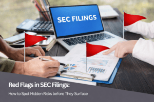 Two people review financial disclosures and charts at a desk with a laptop displaying "SEC FILINGS." Three red flag icons mark points on the papers. Text overlay: "Risk Analysis SEC: Red Flags in Filings&mdash;Spot Hidden Risks Before They Surface.